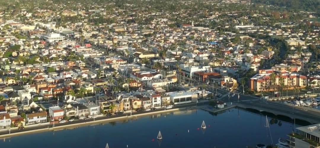Aerial view of a South Orange County harbor and neighborhoods